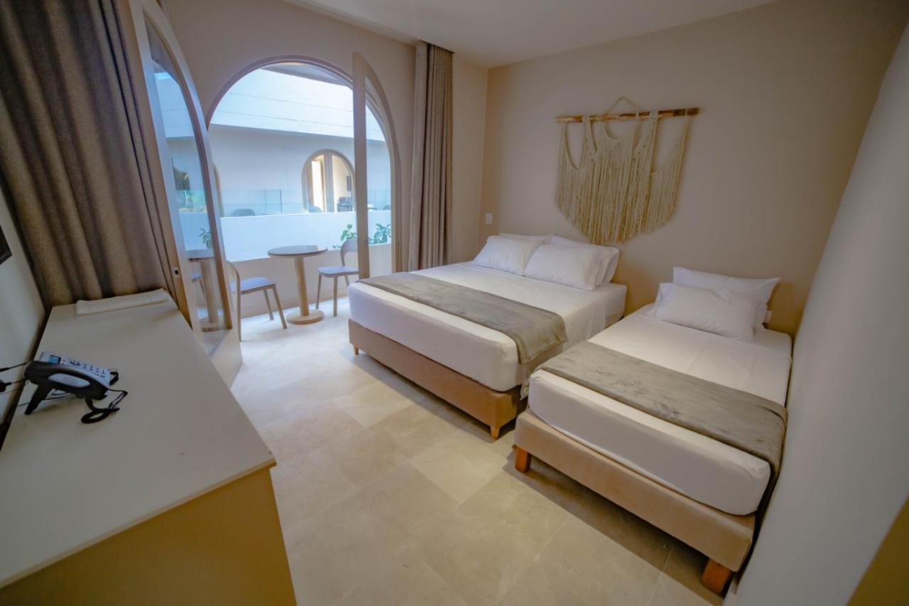 Loa Tolu By Bernalo Hotels ภายนอก รูปภาพ